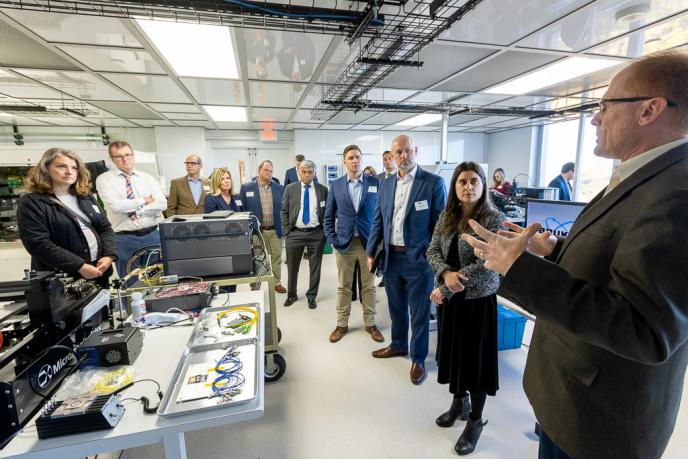 Photo of Acting Assistant Secretary Killingsworth touring the AIM Photonics TAP Facility. 