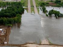 Minot, N.D., June 25, 2011 -- Aerial view of Highway 2, east of Minot closed due to flooding from the Souris River. FEMA Photo by Andrea Booher - Jun 24, 2011 - Location: Minot, ND